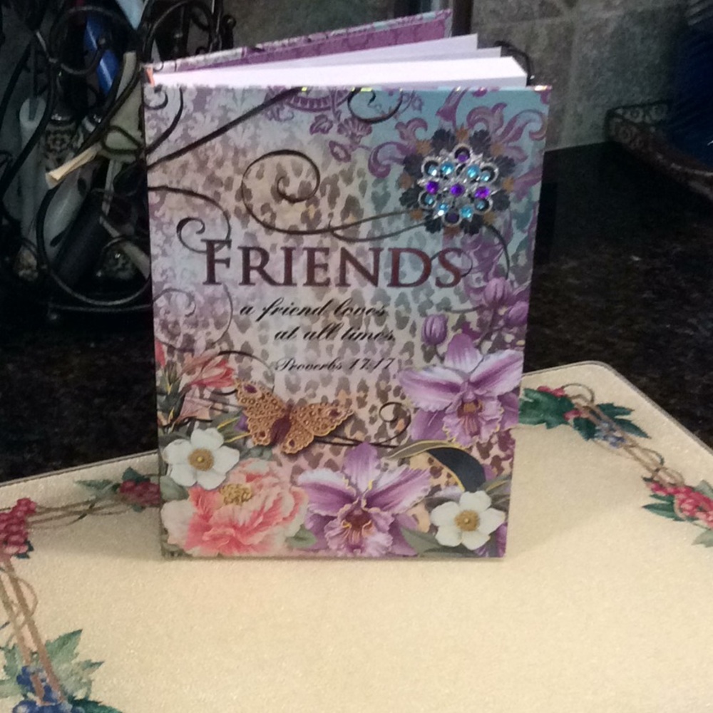 Notebook with beautiful gem on corner